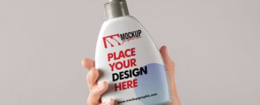 Hand_ Holding_ Cream_ Bottle_ Cosmetic_ Mockup_Design_www.mockupgraphic.com