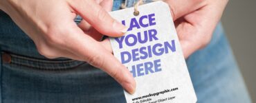 Free_ Hand_ Holding_ Tag_ Mockup_Design_www.mockupgraphic.com